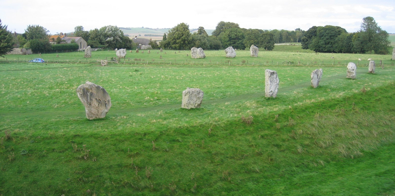 The ditch surrounding the Avebury Stone Circle © essentially-england.com