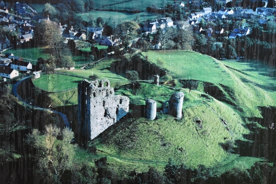 Aerial View over Clun and its Ruined Castle - taken from English Heritage information board © essentially-england.com