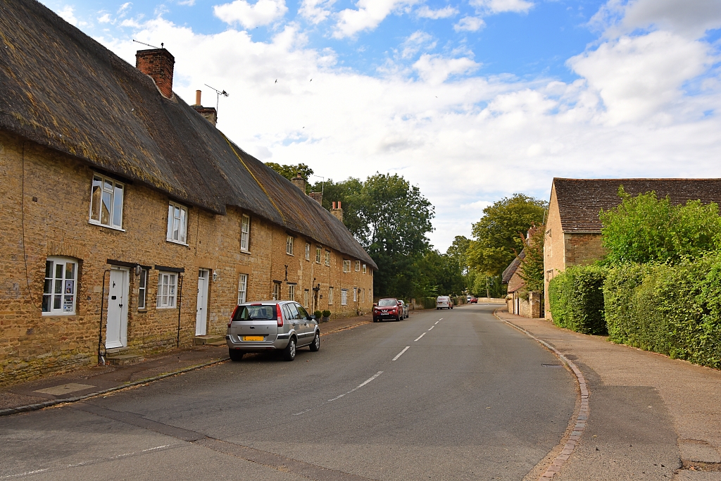 Thatched Cottages on The Road Through Fotheringhay © essentially-england.com