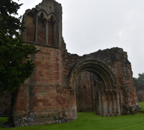 the great west door entrance of peaceful lilleshaw abbey in shropshire