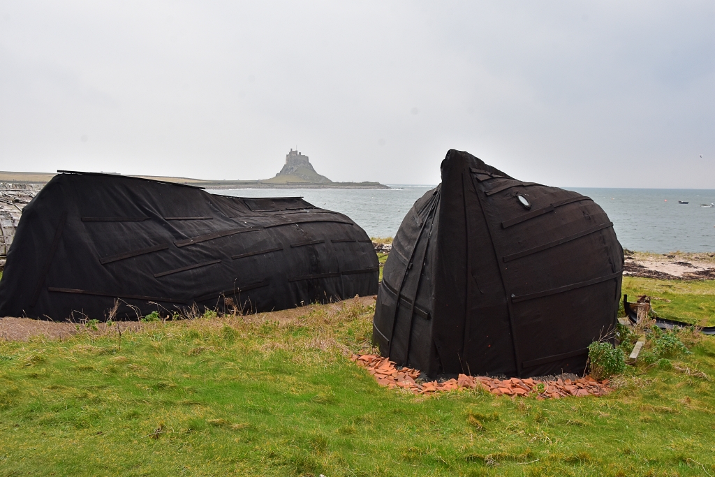 Fishermen Huts on Lindisfarne Beach © essentially-england.com