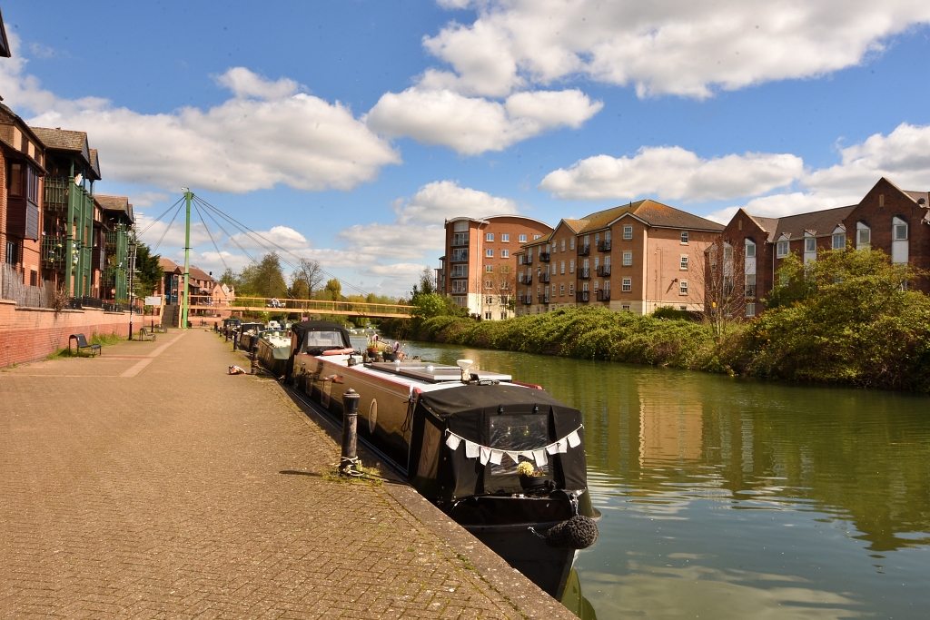 Looking Back at Canal Boats on the River Nene © essentially-england.com
