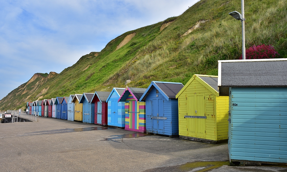 The Colourful Beach Huts Along East Cliff