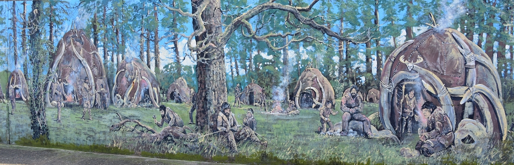 Hunter-Gatherer Mural Along the Promenade in Sheringham © essentially-england.com