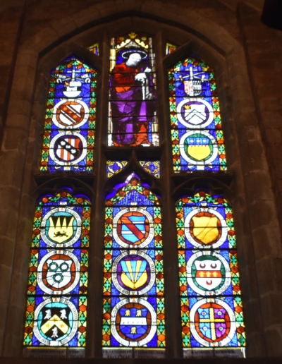 One of the fabulous stained glass windows in Shrewsbury Abbey in Shropshire &copy; essentially-england.com