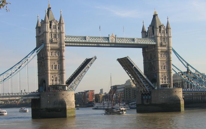 Tall Boat Passing under Tower Bridge © essentially-england.com