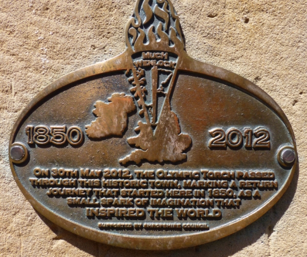 this plaque in the beautiful town of much wenlock in shropshire celebrates the towns connection to the modern day olympics