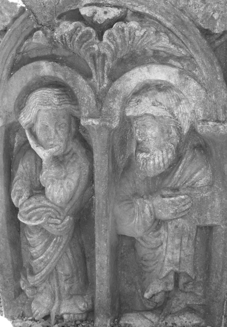 a replica tile on the edge of the lavabo at wenlock priory showing john resting his chin  on his hand with another unknown apostle