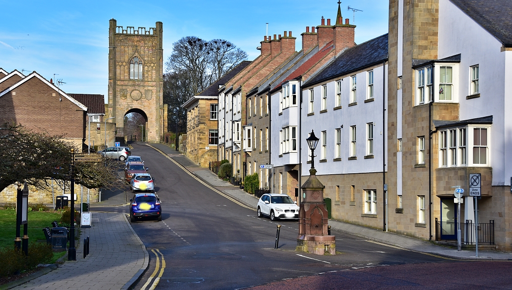 The View up Pottergate Showing the Pottergate Pant and Pottergate Tower © essentially-england.com