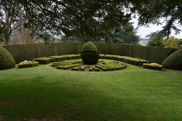 box hedge sun dial in ascott house garden on the buckinghamshire bedfordshire border