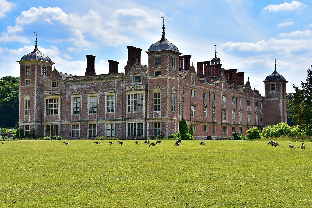 View of Blickling Hall from the Lakeside © essentially-england.com