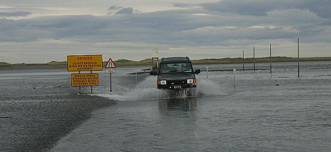 Leaving it Late to Cross the Causeway to Lindisfarne Island © essentially-england.com