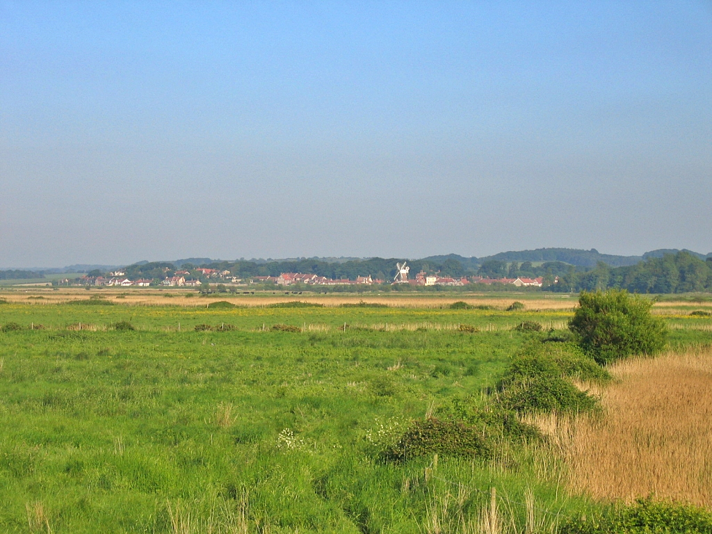 Looking Over the Cley Marshes to Cley Village © essentially-england.com