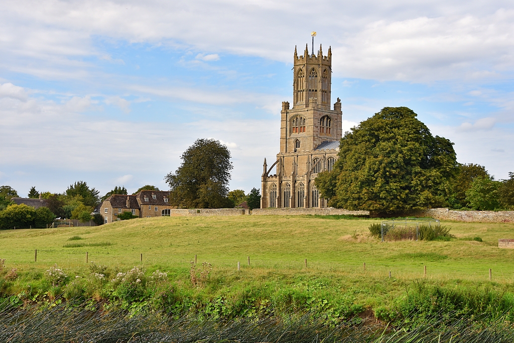 View Towards St. Mary's and All Saints Church in Fotheringhay from the River Nene