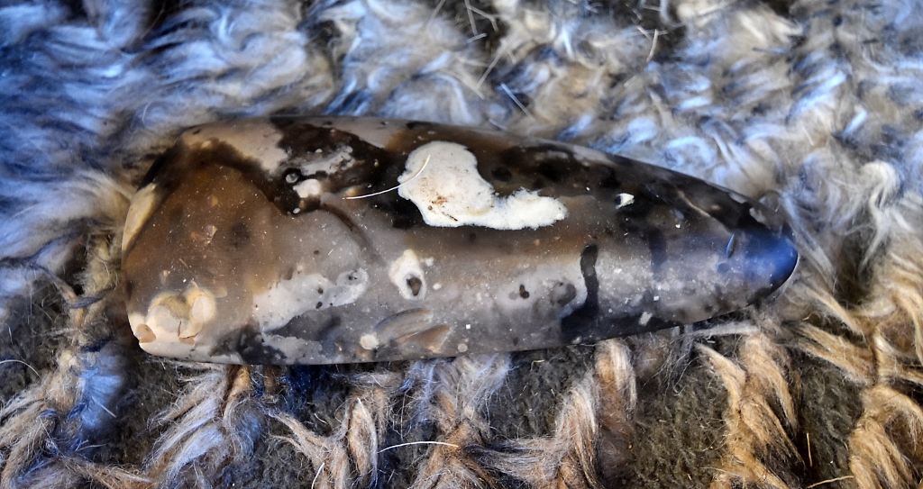 Flint Tool on Display at Grime's Graves © essentially-england.com