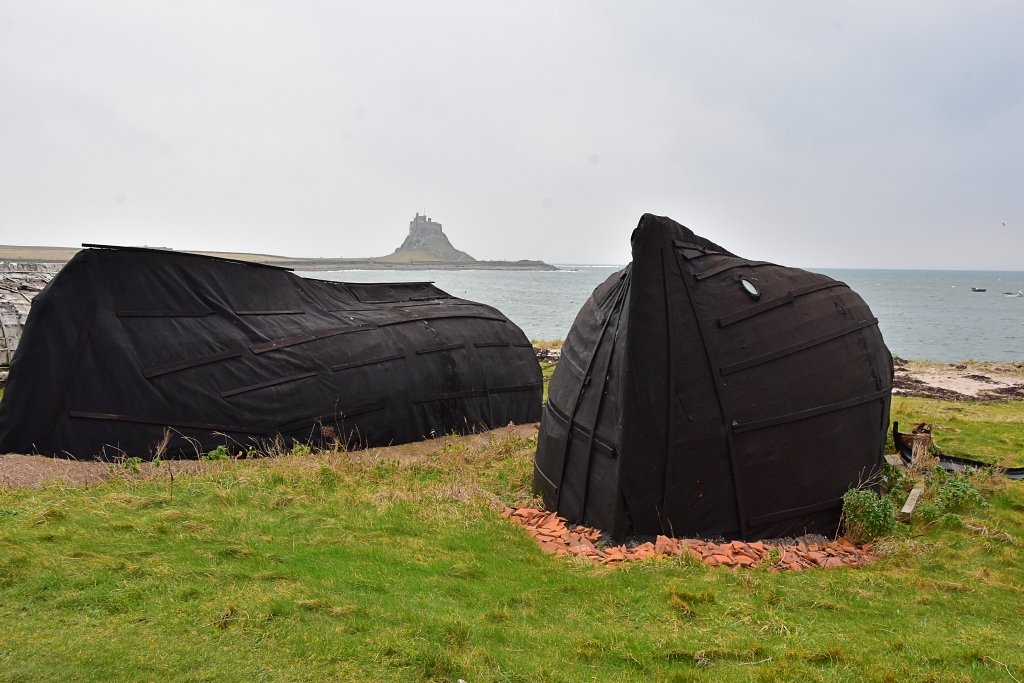 Fishermen Huts on Lindisfarne Beach © essentially-england.com