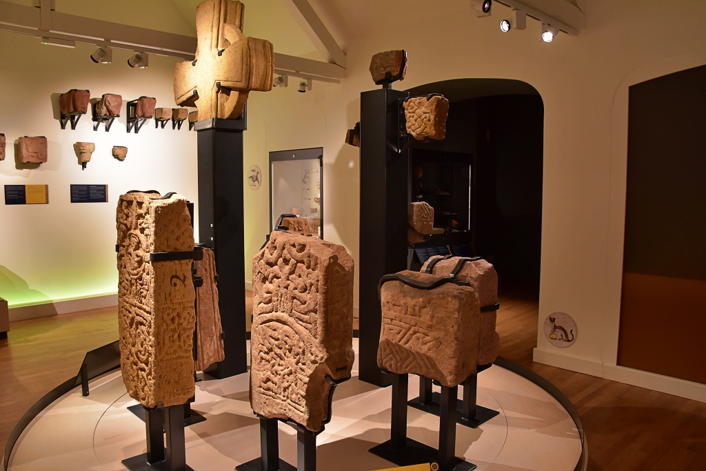 Stone Cross Display in the Lindisfarne Priory Museum © essentially-england.com
