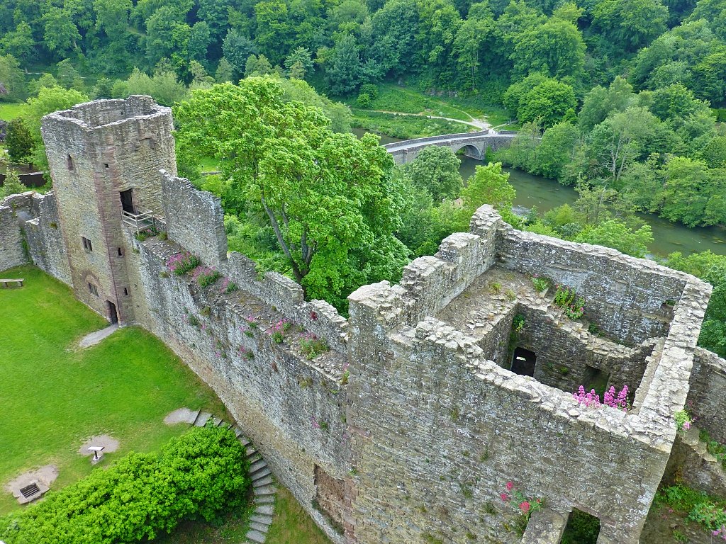 View of Mortimer's Tower, the River Teme, and Dinham Bridge from the Great Tower at Ludlow Castle © essentially-england.com