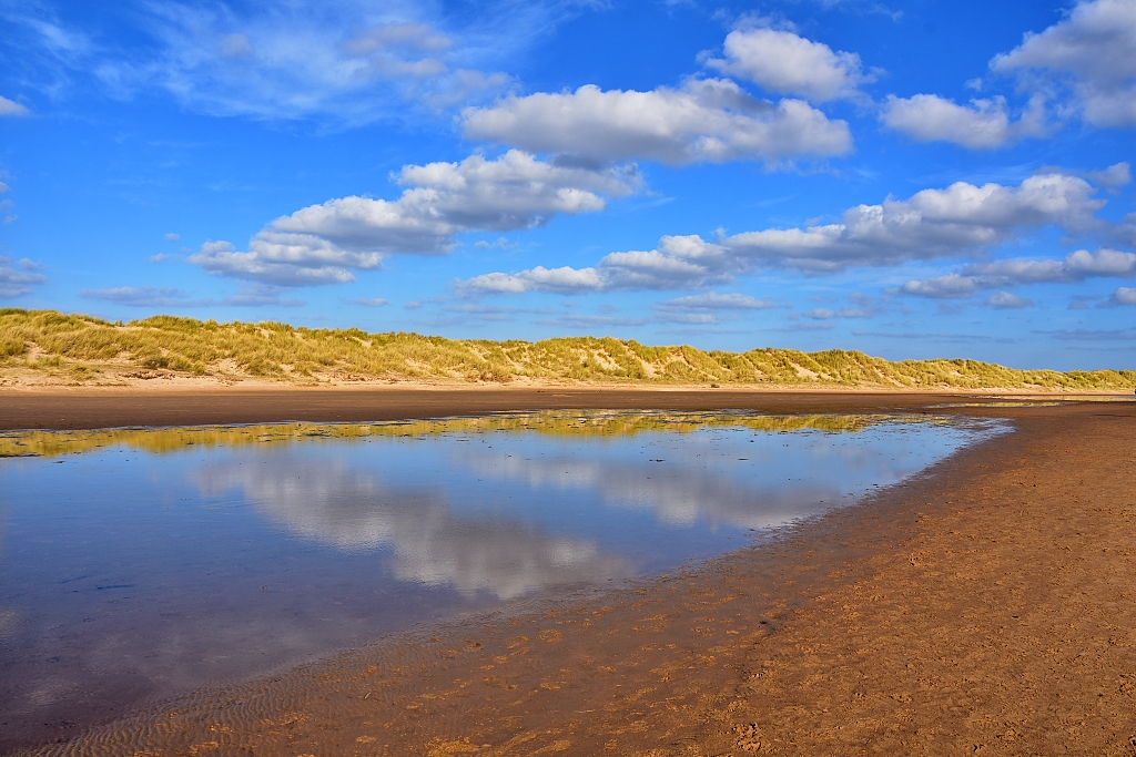 Reflections in the Water Between the Sand Dunes on Wells Beach © essentially-england.com