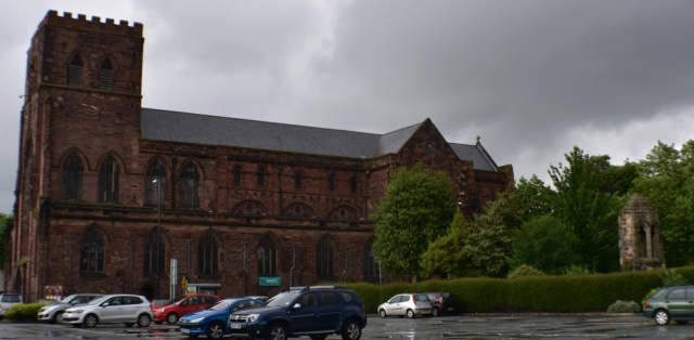 Shrewsbury Abbey has been modified during its history, and a road now separates part of the site. &copy; essentially-england.com