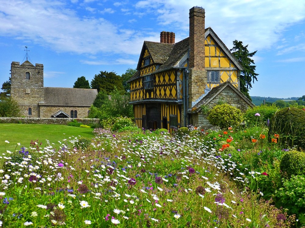 The Gatehouse and The Church of St. John The Baptist © essentially-england.com