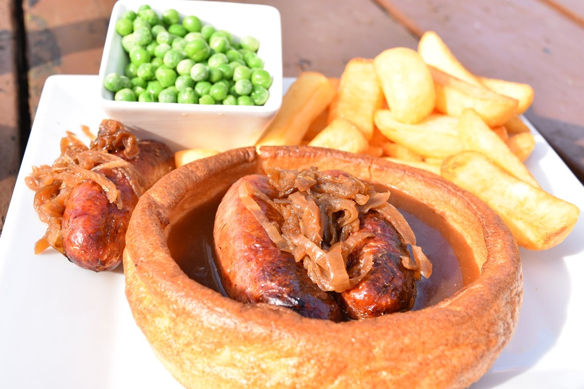 Yorkshire pudding with sausages and gravy